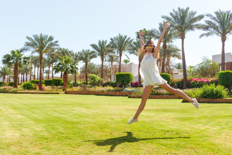 Free happy woman enjoying nature. Freedom concept. Beauty Girl over Sky and Sun in vacation. Enjoyment royalty free stock photo Free happy woman enjoying nature. Freedom concept. Beauty Girl over Sky and Sun in vacation. Enjoyment royalty free stock photo