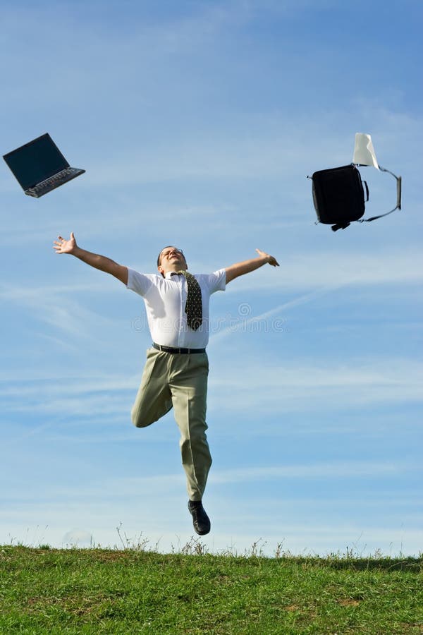 Businessman or office worker throwing away work objects and enjoying the freedom of holiday. Businessman or office worker throwing away work objects and enjoying the freedom of holiday