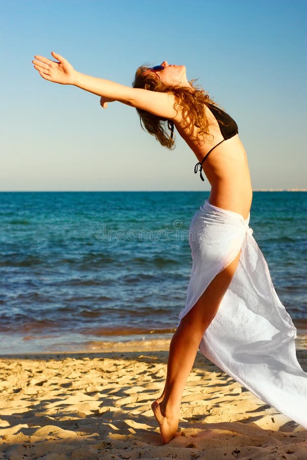 Free happy woman enjoying sunset Stock Photo by ©Maridav 26073829