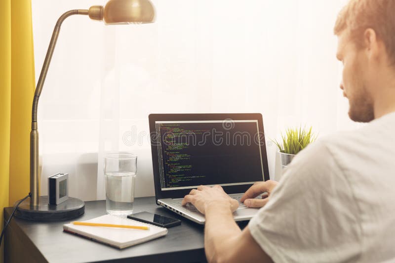 Freelance programmer working from home stock photos