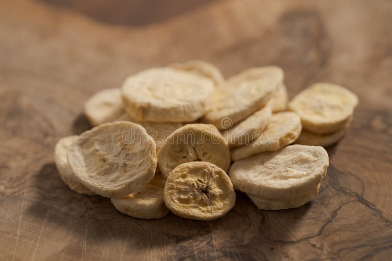 Freeze Dried Banana Chips on Olive Board Stock Photo Image of slice