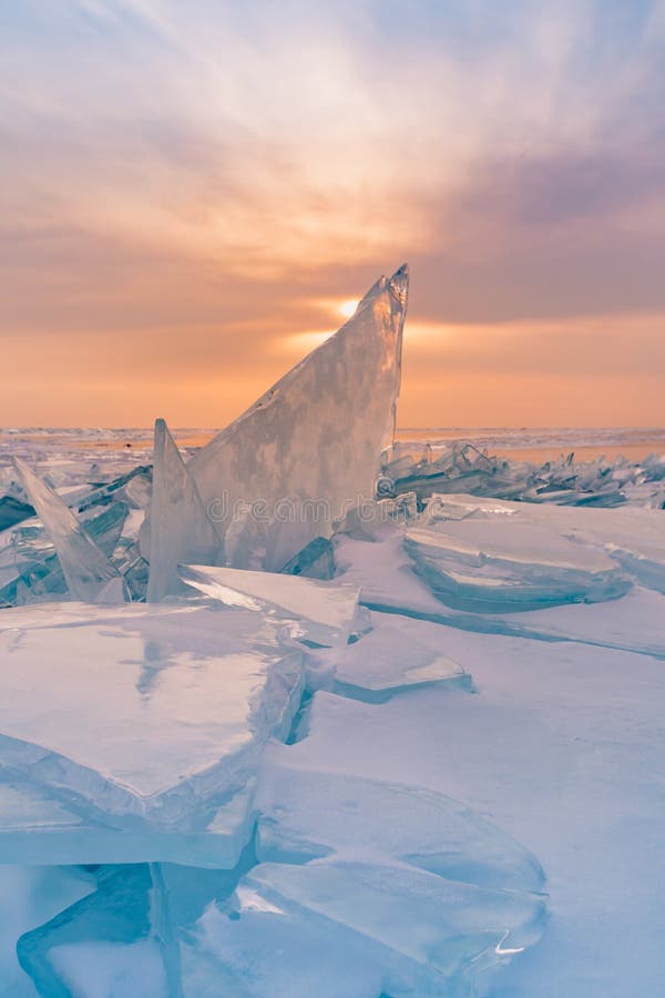 Freeze ice breaking close up with sun light