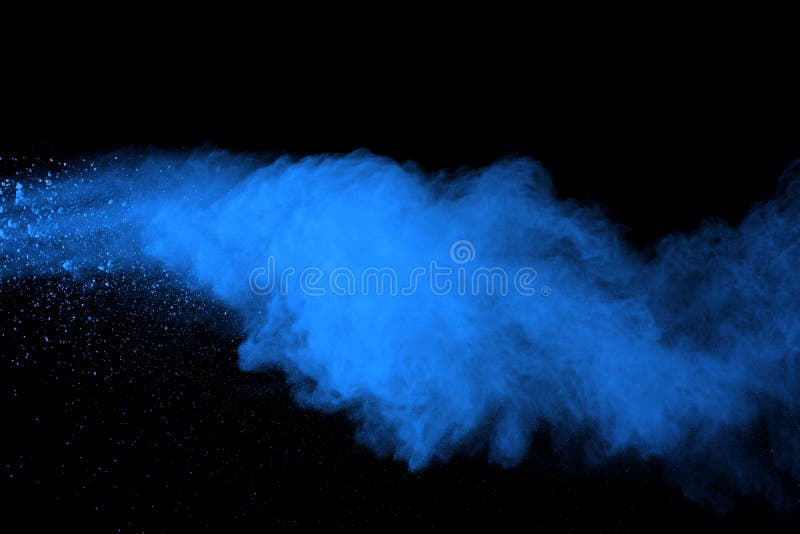 Freeze motion of blue powder explosions on black background