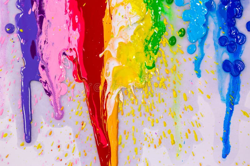 Colorful Paint Dripping Isolated on White Background. Stock Photo