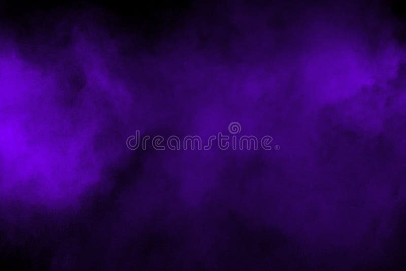 Freeze motion explosion of purple powder dust on a black background. By throwing blue talcum out of hand. Stopping the movement royalty free stock image Freeze motion explosion of purple powder dust on a black background. By throwing blue talcum out of hand. Stopping the movement royalty free stock image