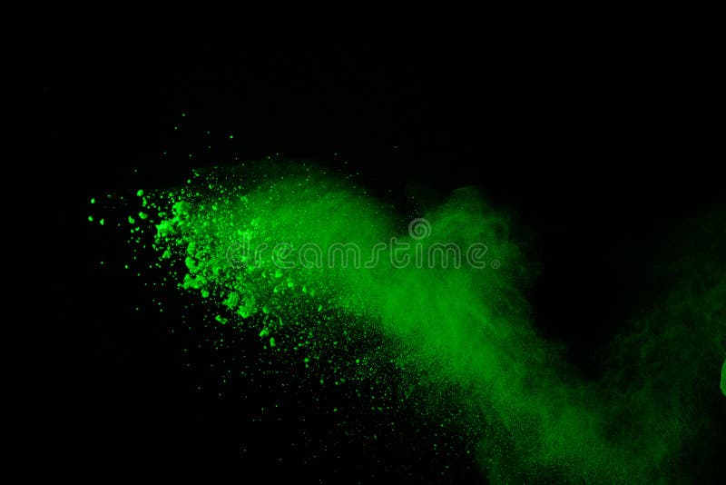 Freeze motion of green powder exploding/throwing green dust on black background.