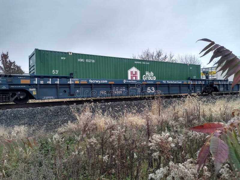 Freight train on railroad tracks royalty free stock photo