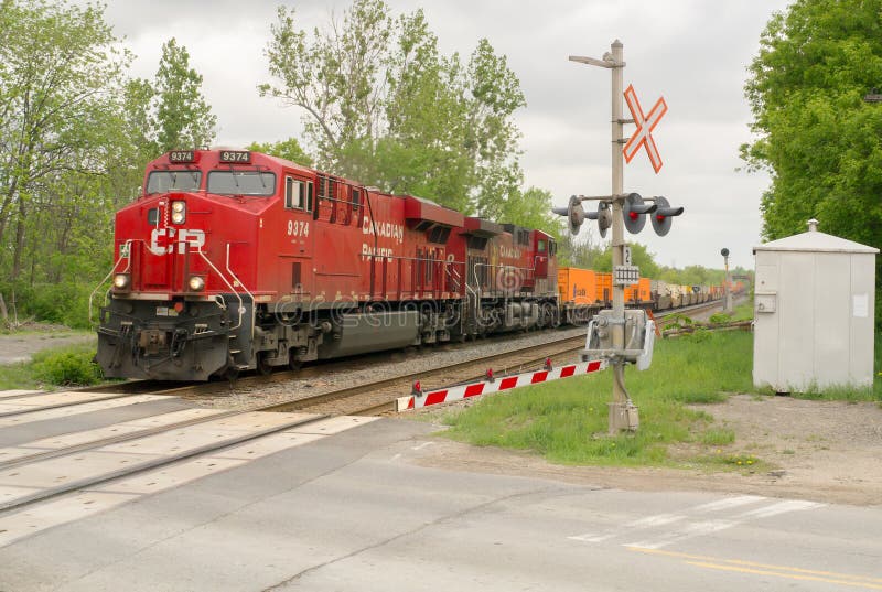 Freight Train at Road Crossing