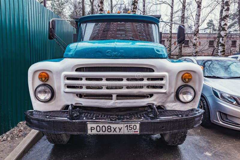 Freight truck ZIL 130 on the rainy city street stock photo Freight truck ZIL 130 on the rainy city street stock photo