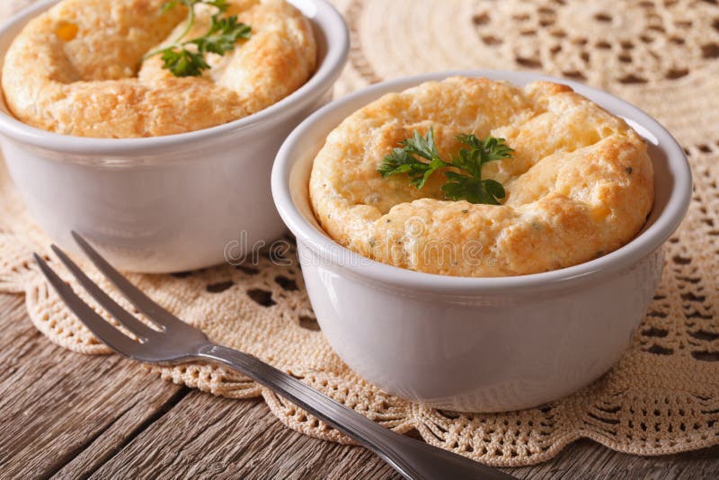 French Baked Cheese Souffle in White Rameken Closeup. Horizonta Stock