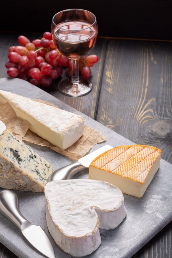 French Cheeses Plate in Assortment, Neufchatel Heart Shaped Age Stock