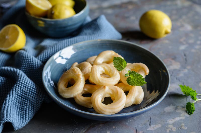 French Cruller Donuts with lemon glaze stock images French Cruller Donuts with lemon glaze stock images