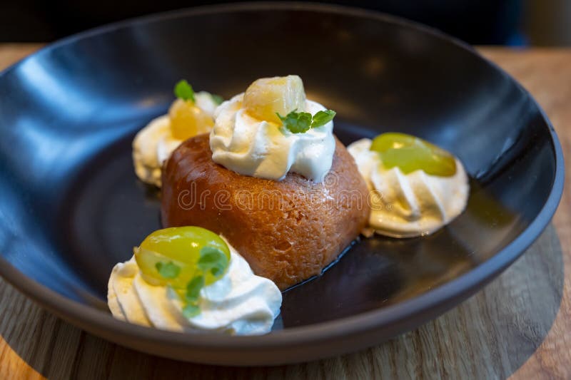 French Desssert Baba Au Rhum with Whipped Cream Stock Image Image of