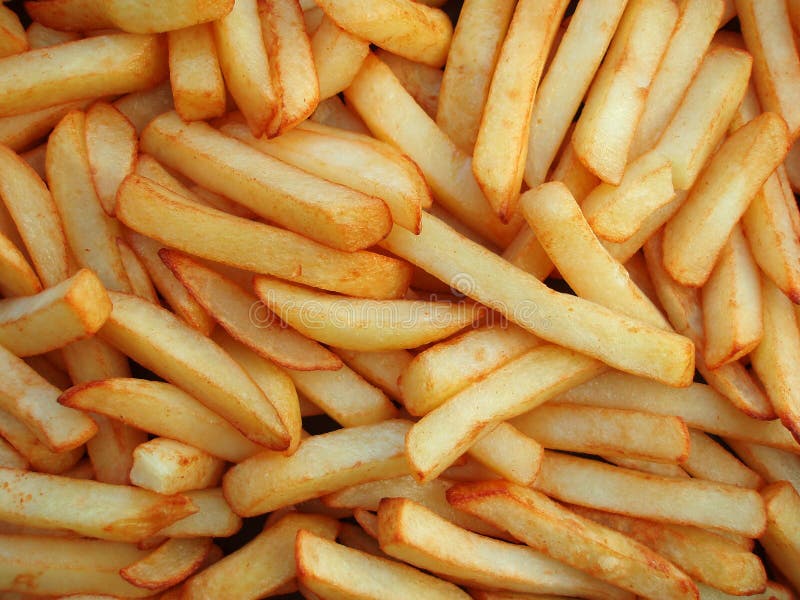 Close-up di oleosa delle patatine fritte come sfondo.