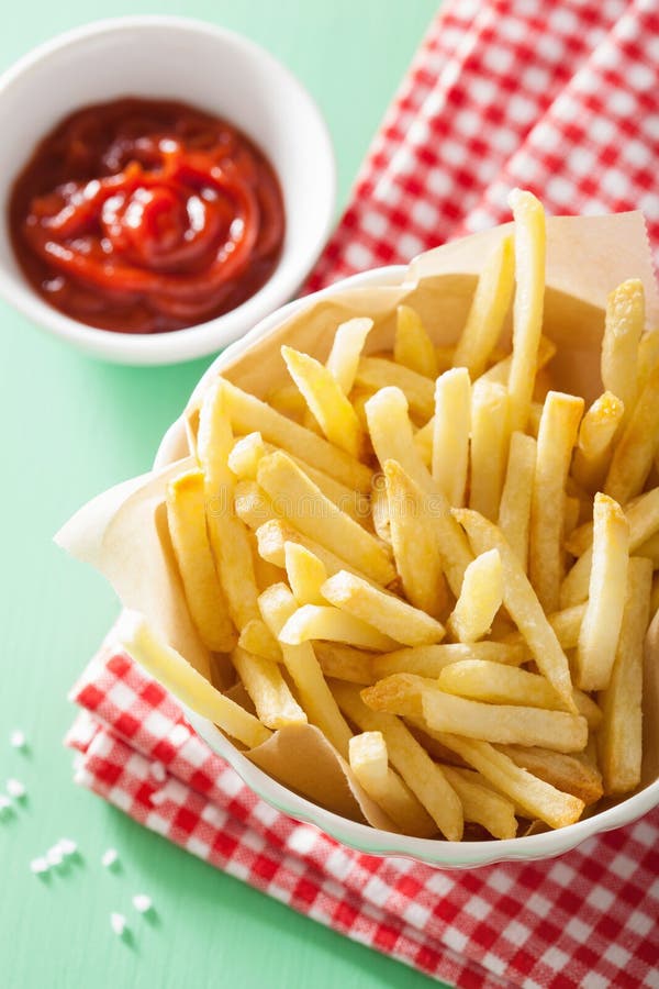 French Fries With Ketchup Over Green Background Stock Photo Image of
