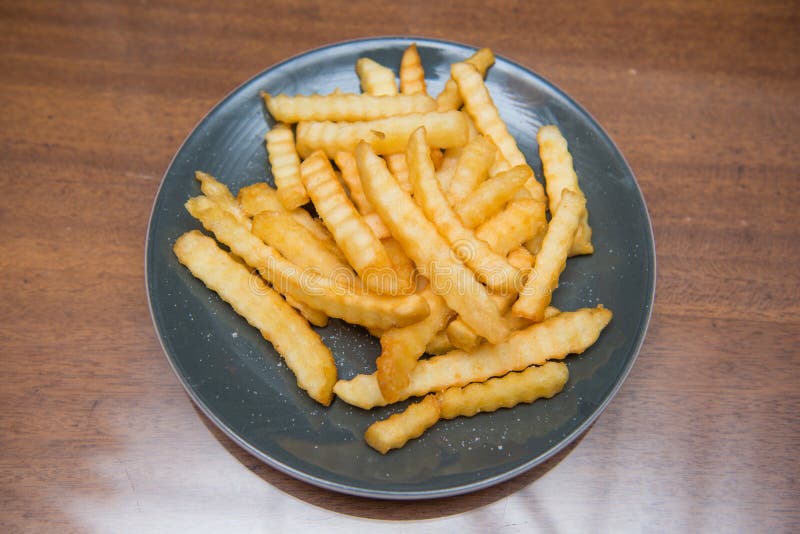 French Fries Sprinkle Salt for Dinner Stock Photo Image of junk, fries 55609520