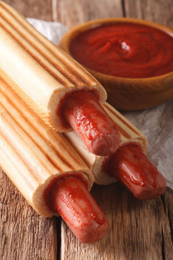 French Hot Dogs with Ketchup Closeup. Vertical Stock Photo Image of