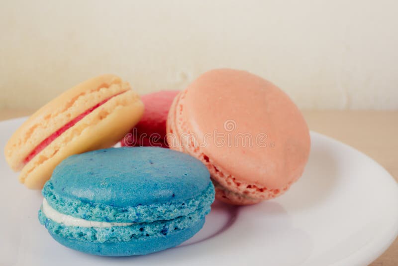 French macaroons on plate stock image. Image of confectionery 50906341