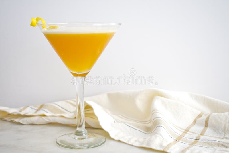 French Martini Garnished with a Lemon Twist stock photography French Martini Garnished with a Lemon Twist stock photography