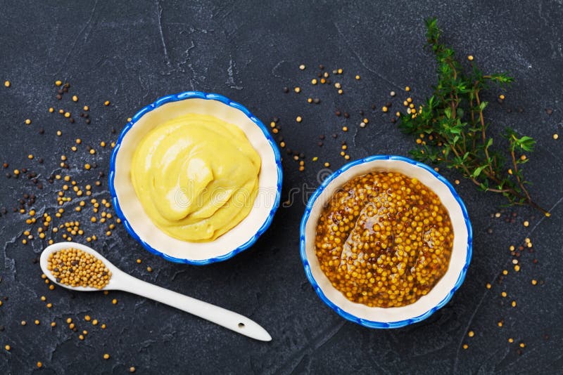 French Mustard, Dijon Mustard and Powder on Wooden Rustic Table from