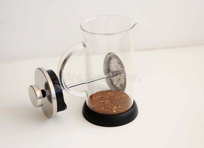 French Press with Ground Coffee. on Coffee Taster`s Flavor Wheel. Top