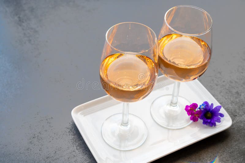 French Rose Wine from Provence in Two Glasses in Sunny Day Stock Photo