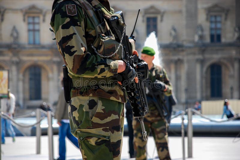 French soldier patrolling on street
