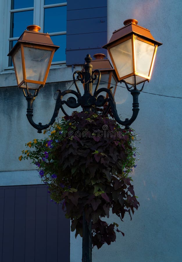 French Style Old Vintage Street Light in Small Village in Proven Stock