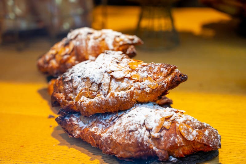 French Sweet Dessert Pastry with Almonds on Display in French Bakery