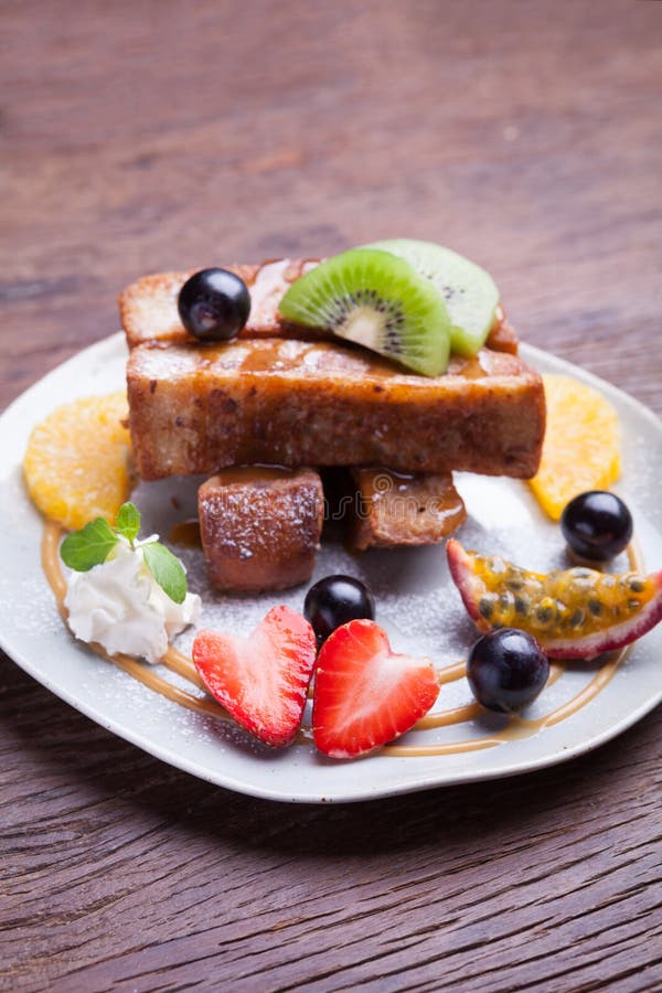 French Toast and Fresh Fruit with Caramel Sauce Stock Image Image of