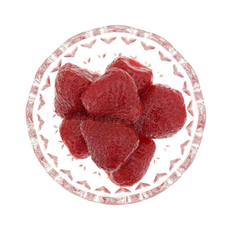 Fresas conservadas en la opinión superior del plato de cristal foto de archivo libre de regalías Fresas conservadas en la opinión superior del plato de cristal foto de archivo libre de regalías