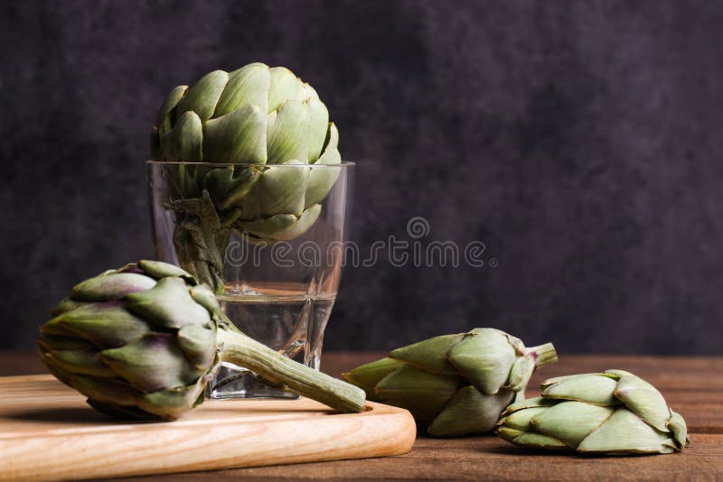 Artichokes in a glass jar stock image. Image of plant 4331399