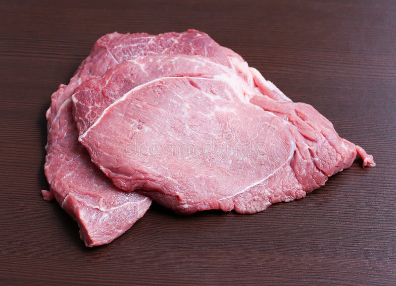 Fresh beef steak on the table. stock photos Fresh beef steak on the table. stock photos