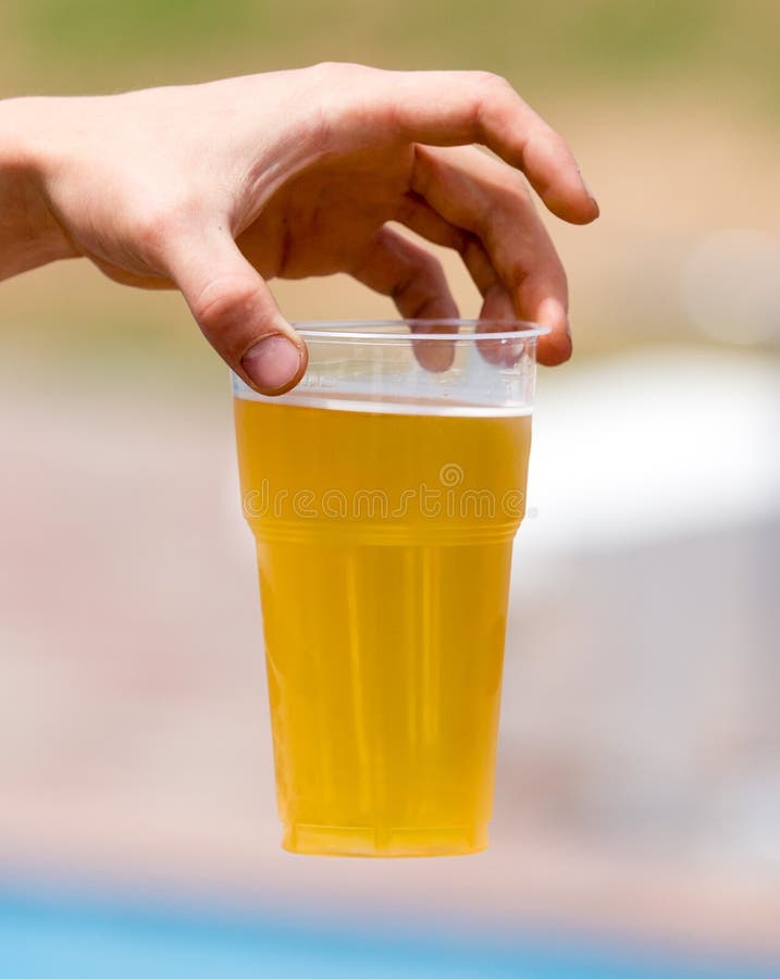 Fresh Beer in a Plastic Cup in the Hand Stock Photo Image of beer
