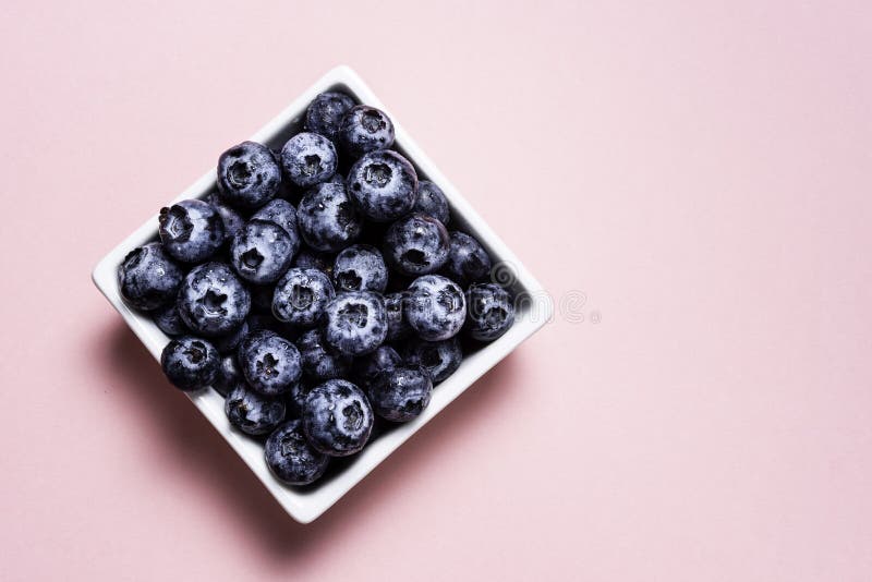 Fresh Blueberries Inside Pot On Pink Background Stock Photo Image of heart, close 147557080