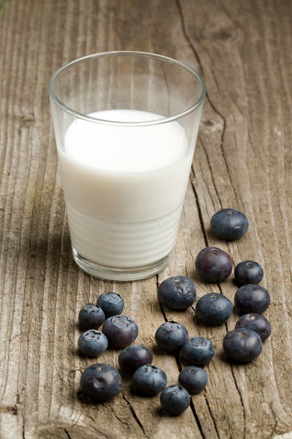 Fresh blueberries with milk