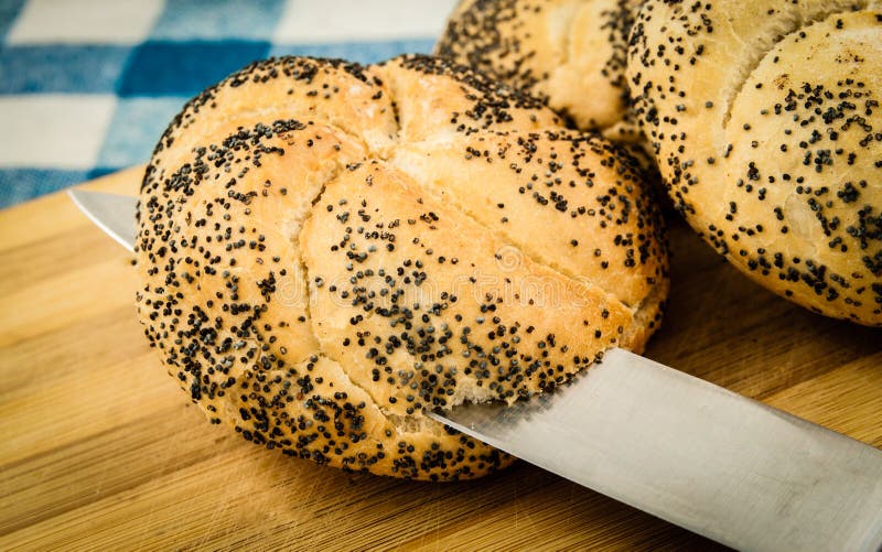 Fresh Bread Rolls with Poppy Seeds. Stock Photo Image of mill, board