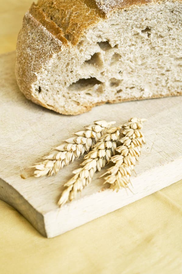 Fresh bread and wheat spikes