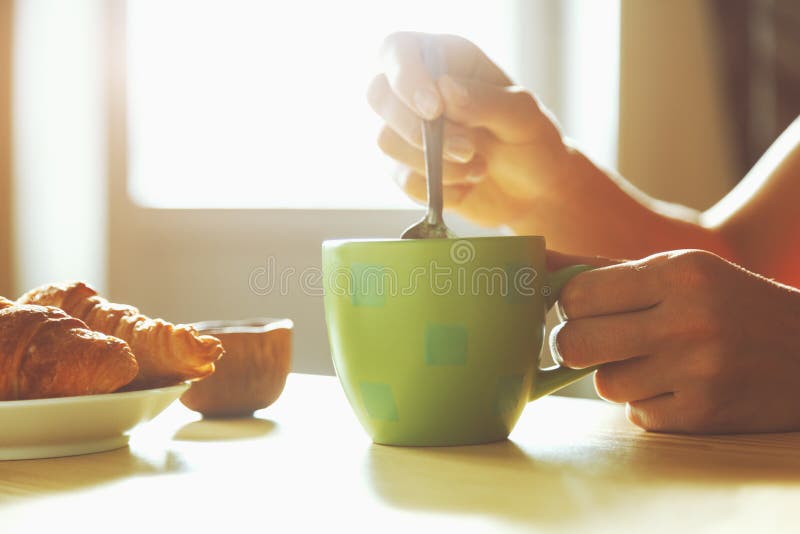 Fresh breakfast with hot coffee and croissant royalty free stock photo