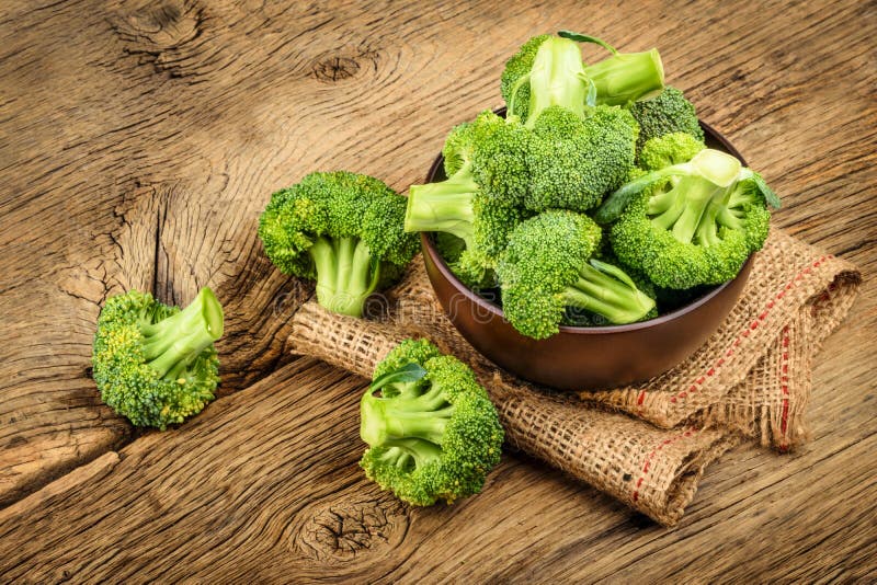 Fresh broccoli on wooden background