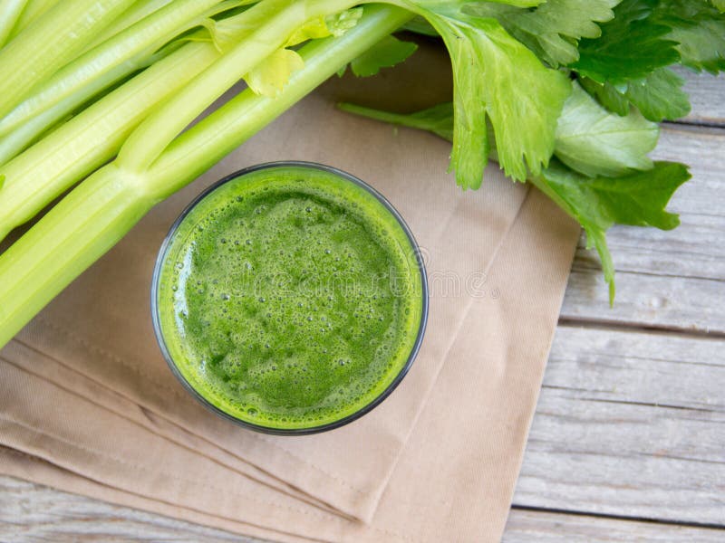Fresh celery smoothy juice stock photography