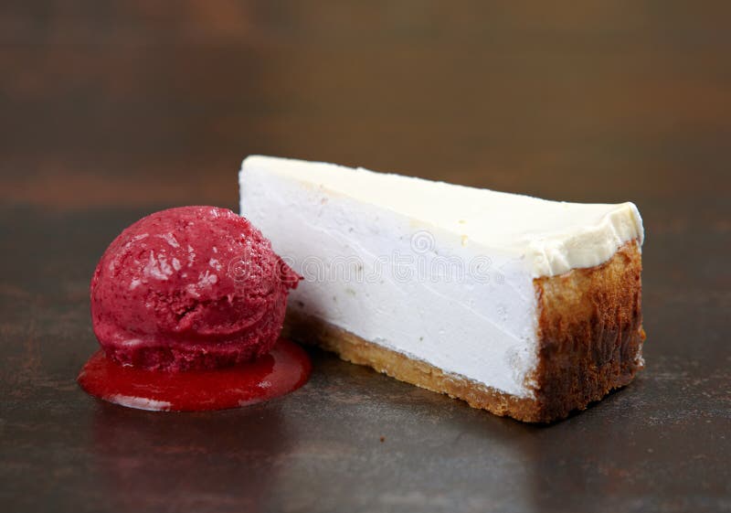 Fresh cheesecake with sorbet ball stock image Fresh cheesecake with sorbet ball stock image