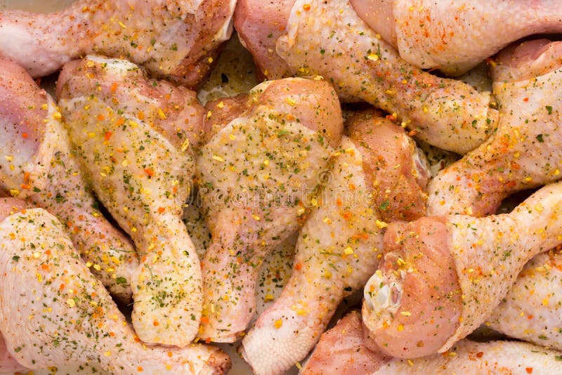 Fresh Chicken Leg, Meat on Plate.with Spices. Stock Photo Image of