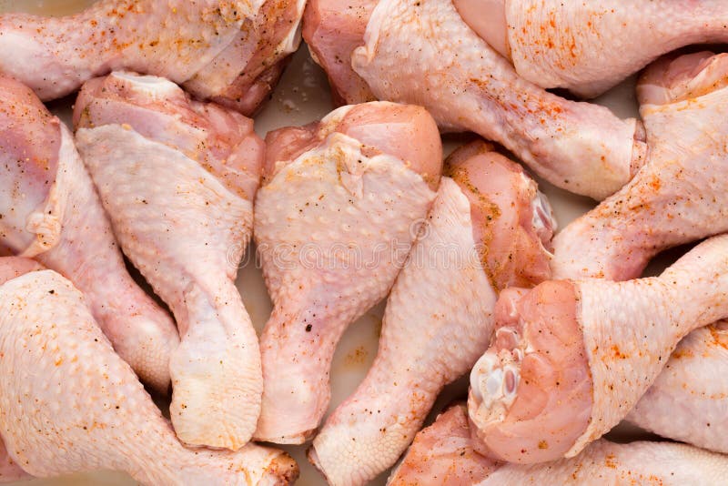 Fresh Chicken Leg, Meat on Plate.with Spices. Stock Photo Image of