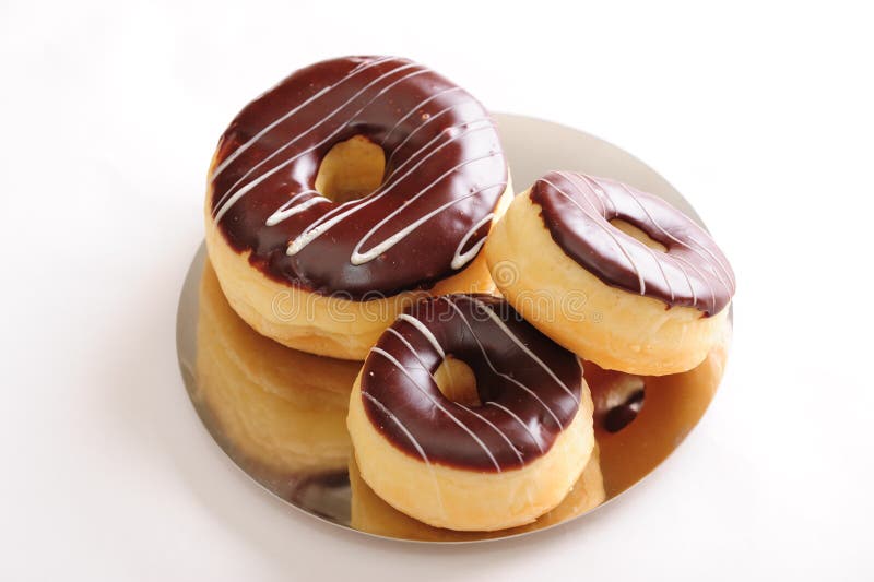 Fresh chocolate donuts stock photos