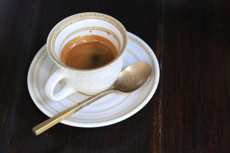 Fresh Coffee on Wooden Table. Espresso Coffee Short on Table Stock