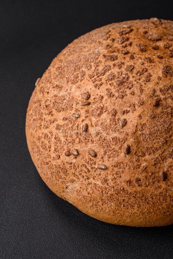 Fresh Crispy Brown Bread with Sesame Seeds and Spices Stock Photo
