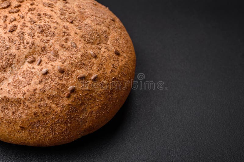 Fresh Crispy Brown Bread with Sesame Seeds and Spices Stock Photo