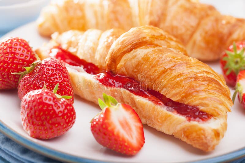 Fresh Croissants with Jam and Strawberry for Breakfast Stock Photo