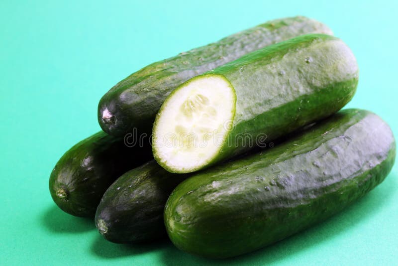 Fresh Cucumbers on Green. Cucumbers for Diet and Healthy Eating. Stock Image Image of nutrient
